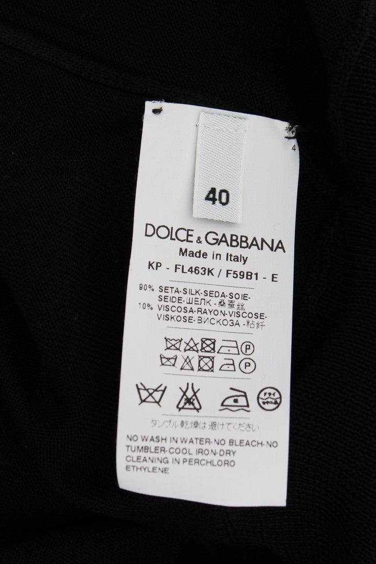 Schwarzes Poloshirt aus Seide mit Blumenstickerei