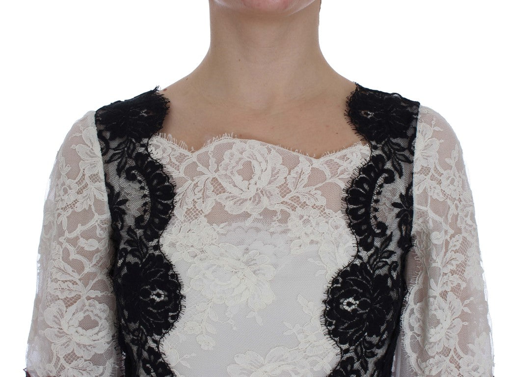 Weißes, bodenlanges Kleid aus floraler Spitze