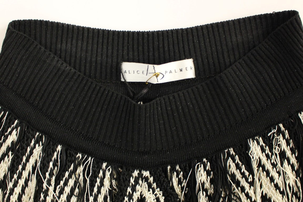 Weiß-schwarzer gestrickter asymmetrischer Rock