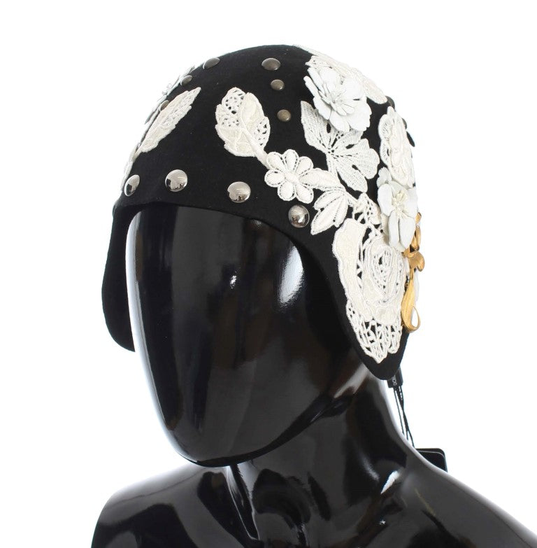 Schwarze Wollmütze mit weißem Blumenmuster und Blattgold