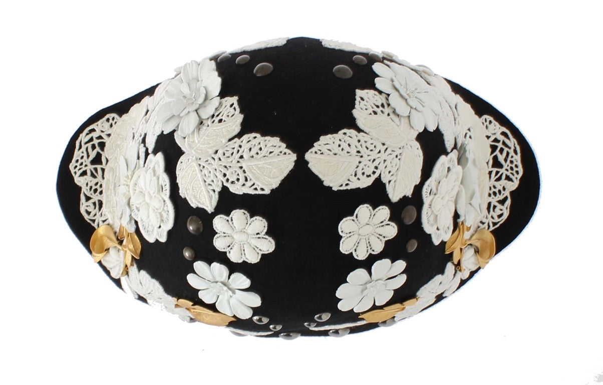 Schwarze Wollmütze mit weißem Blumenmuster und Blattgold