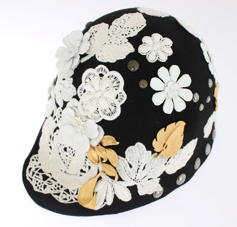 Schwarze Wollmütze mit weißem Blumenmuster und Blattgold