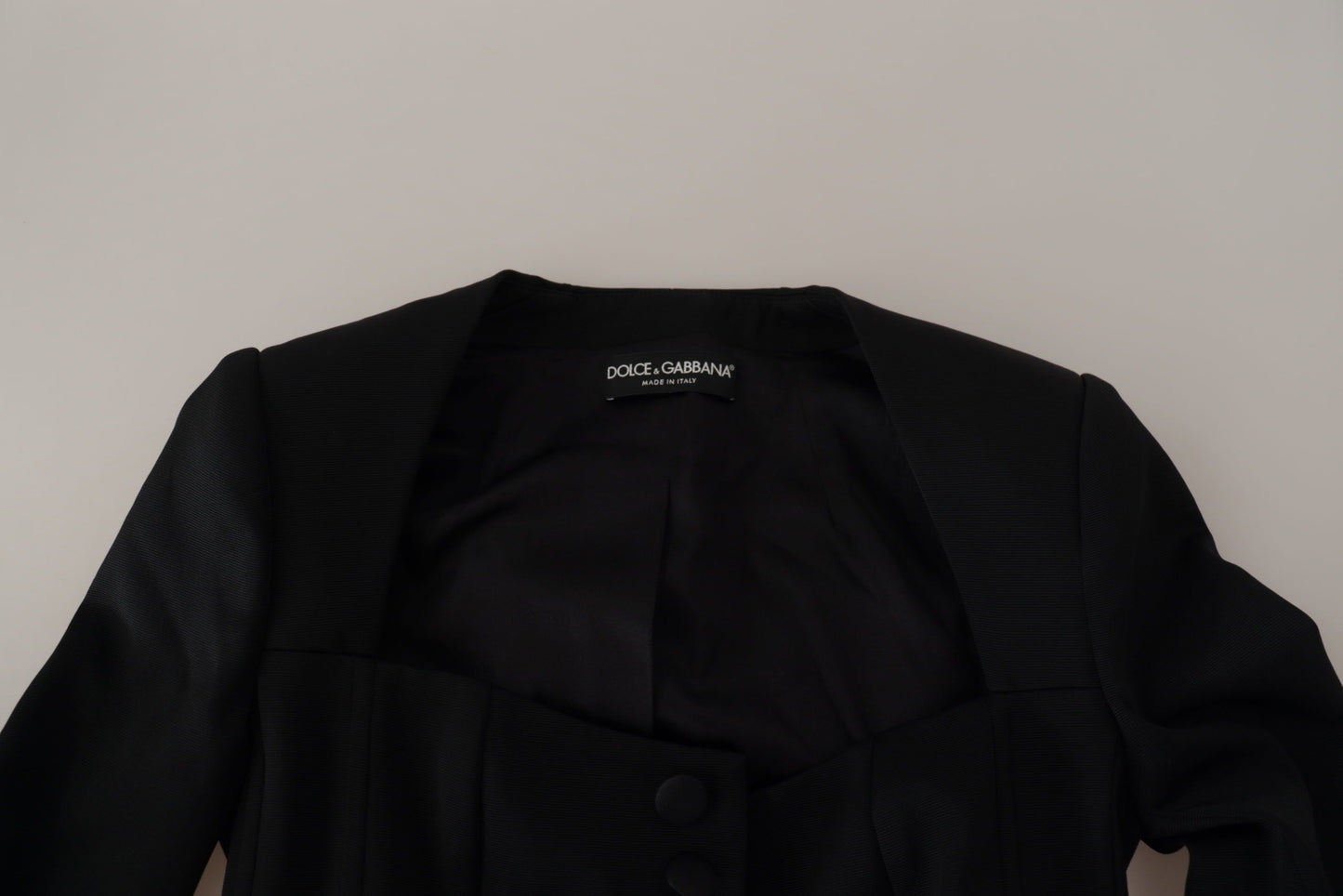Schwarze Slim Fit-Jacke mit langen Ärmeln und Druckknöpfen