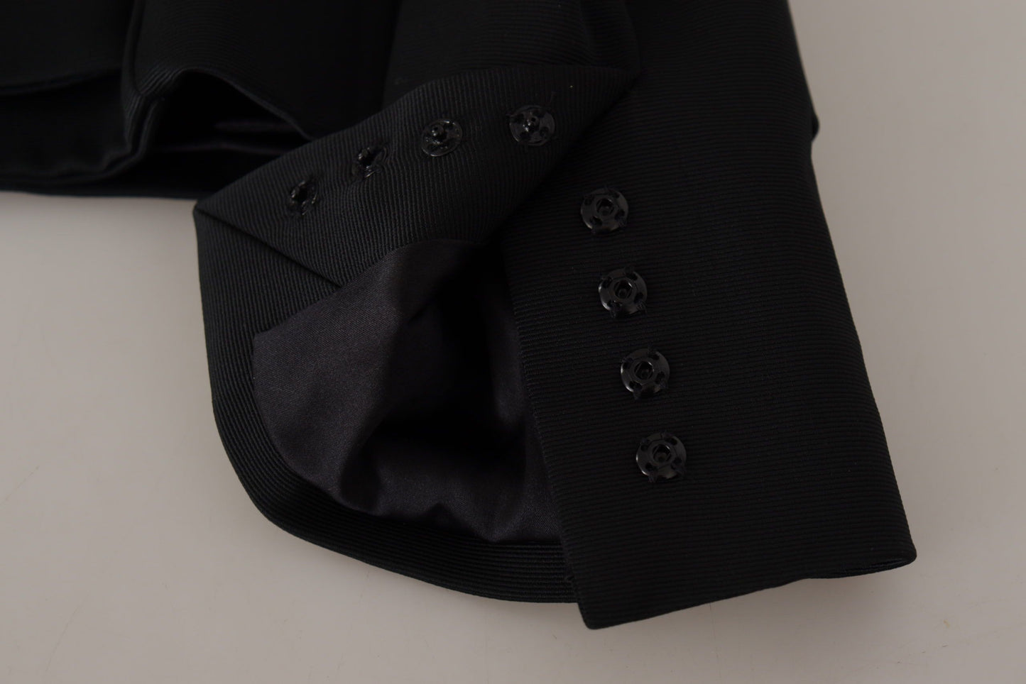 Schwarze Slim Fit-Jacke mit langen Ärmeln und Druckknöpfen