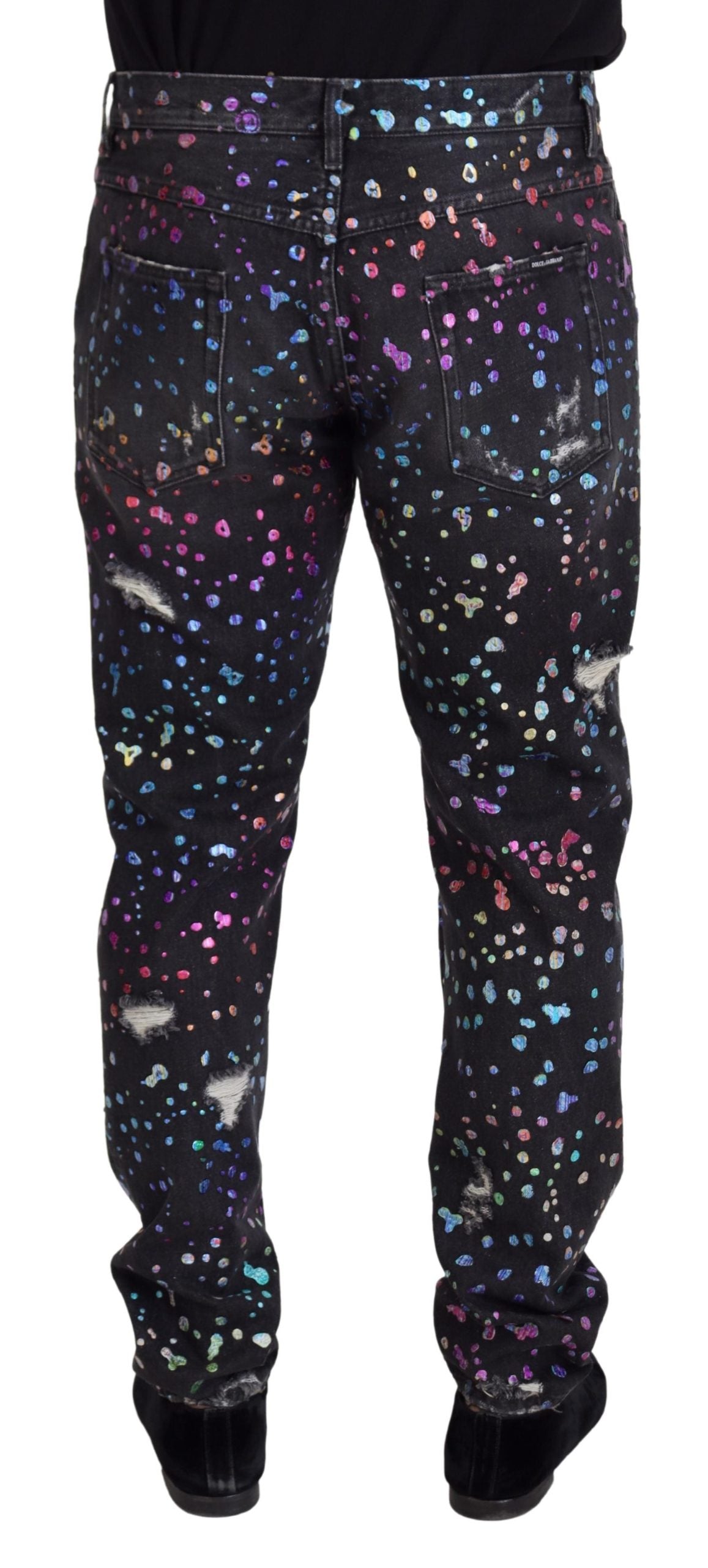 Schwarze zerfetzte Jeans mit mehrfarbigem Print