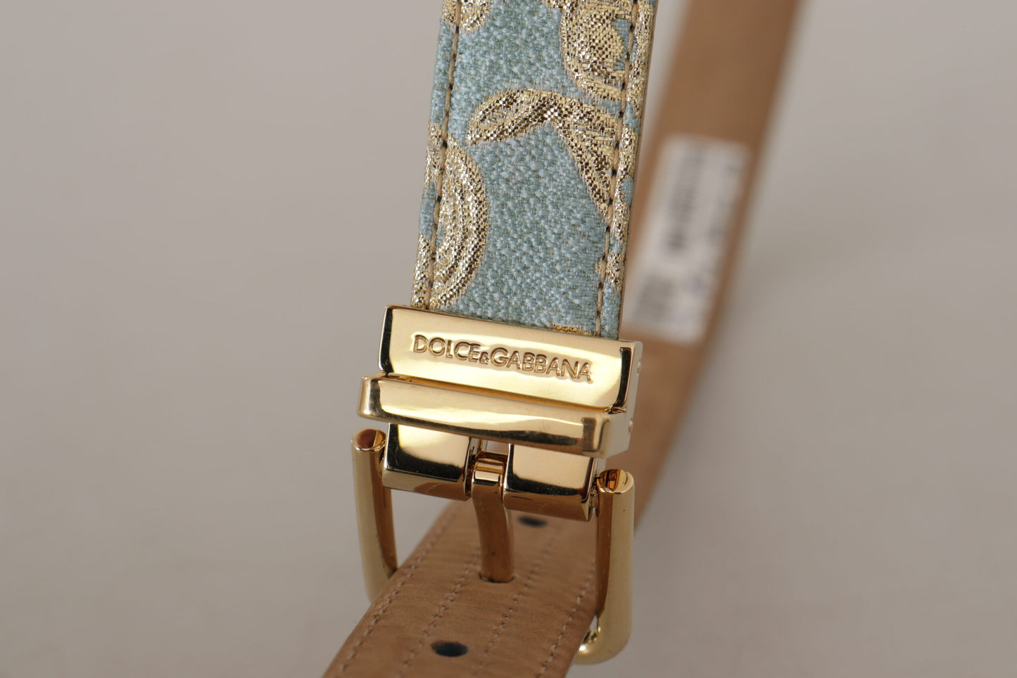 Blauer Ledergürtel aus Jacquard mit geprägter goldener Metallschnalle