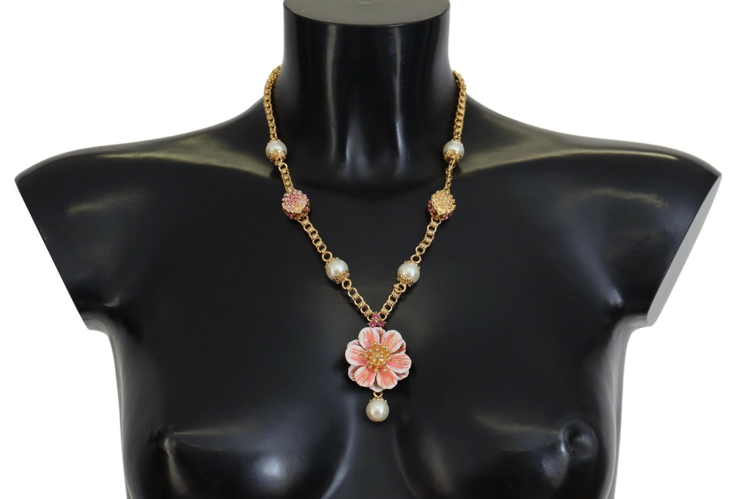 Goldfarbene Halskette mit floralen Kristallen und rosa Verzierung