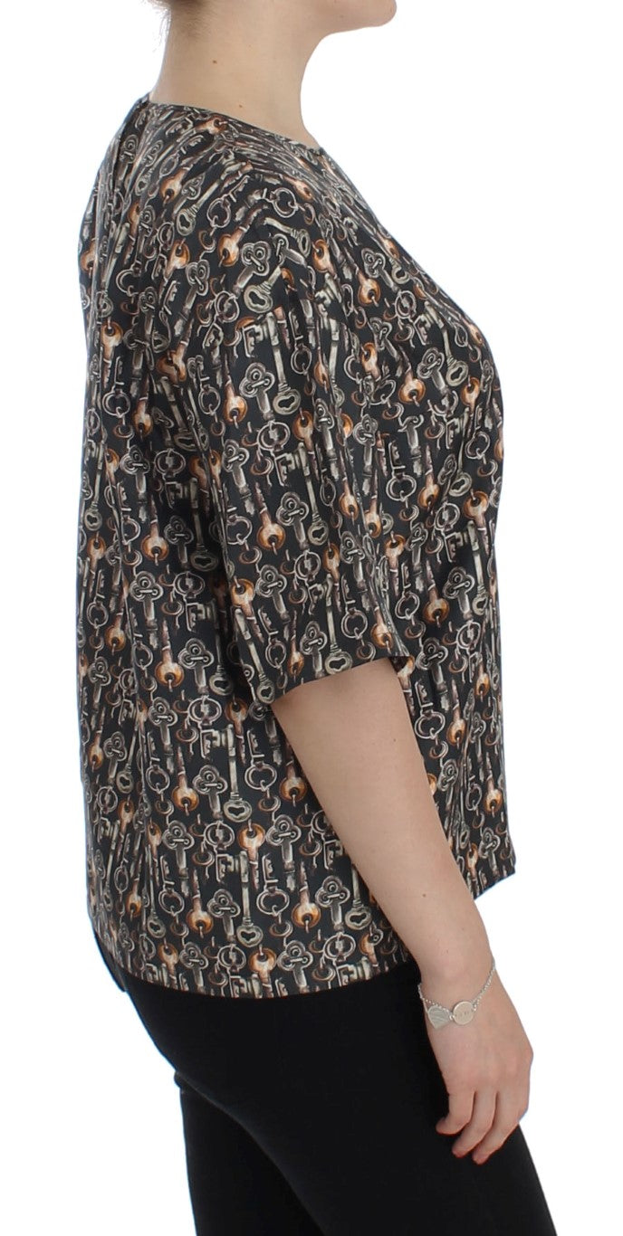 Graues Seidenblusen-T-Shirt mit goldenem Schlüsseldruck