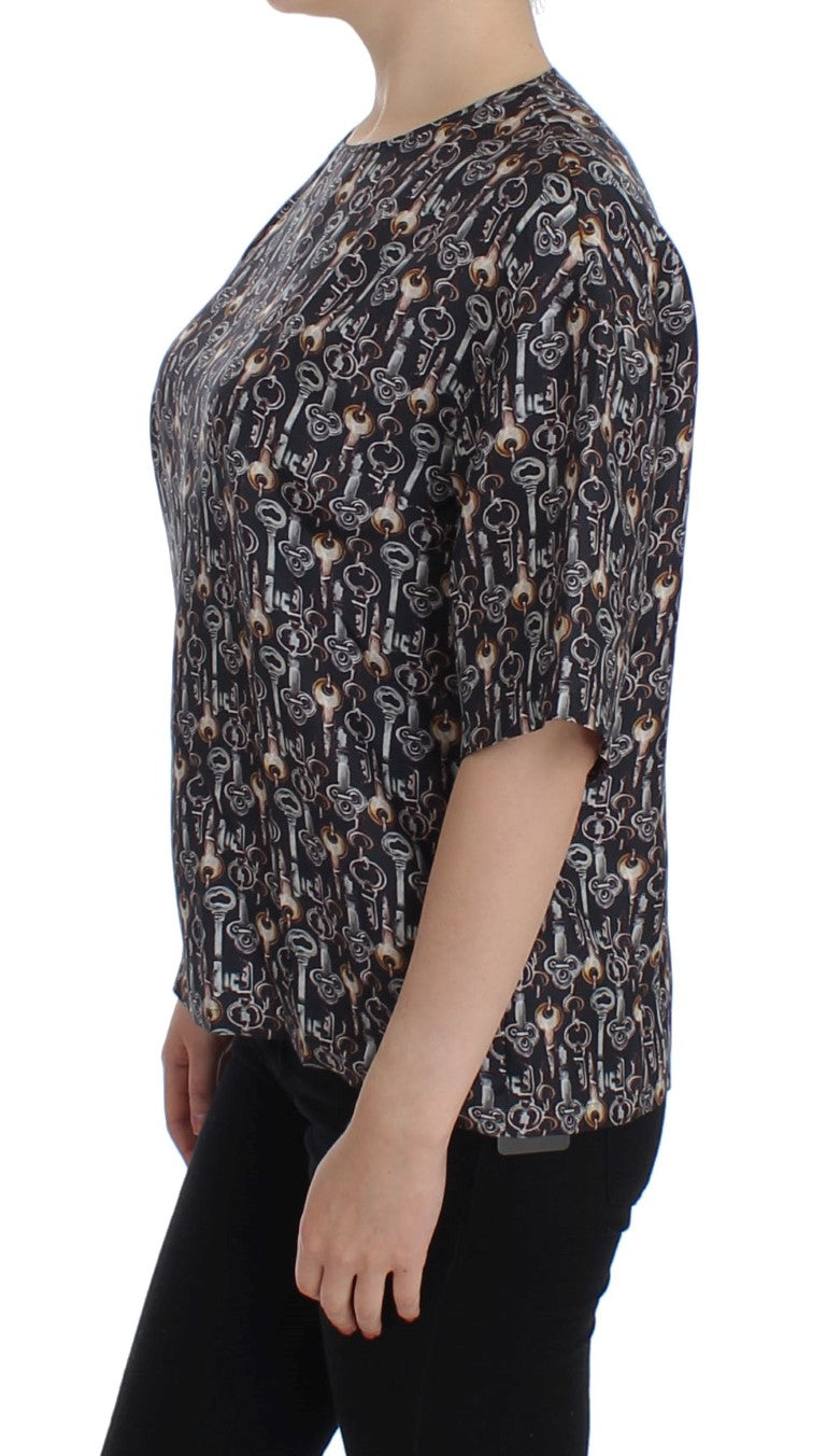 Graues Seidenblusen-T-Shirt mit goldenem Schlüsseldruck