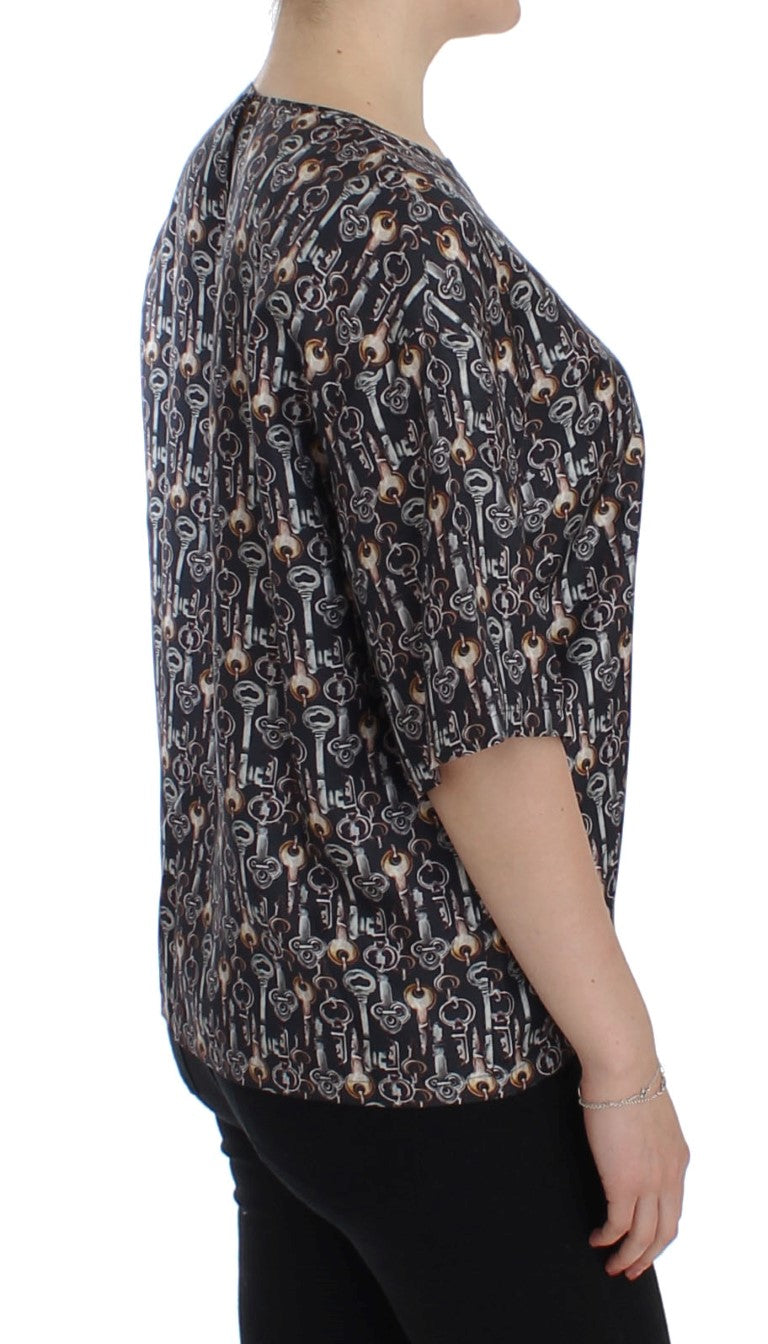 Graues Seidenblusen-T-Shirt mit goldenem Schlüsseldruck