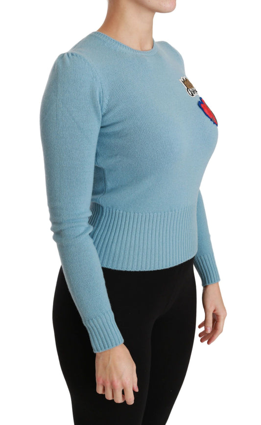 Blauer Wollpullover mit Queen-Herz