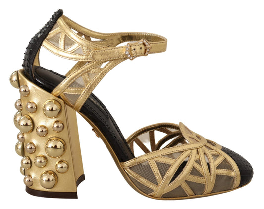 Schwarz-goldene Lederschuhe mit Knöchelriemen und Nieten