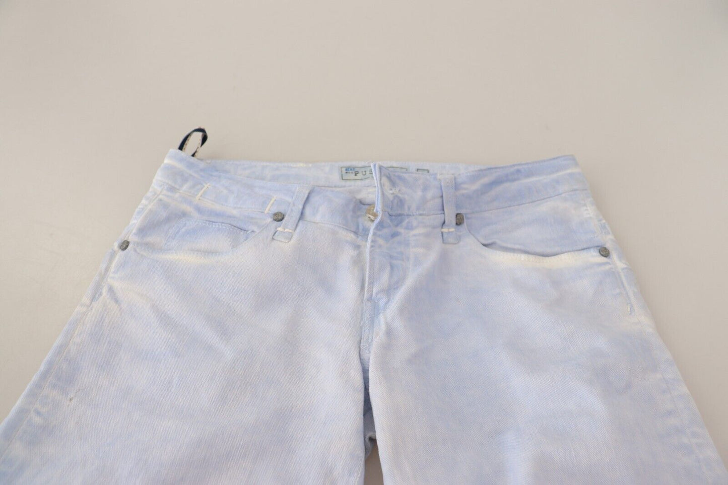 Hellblaue Skinny-Jeans aus Baumwolle mit gefaltetem Saum