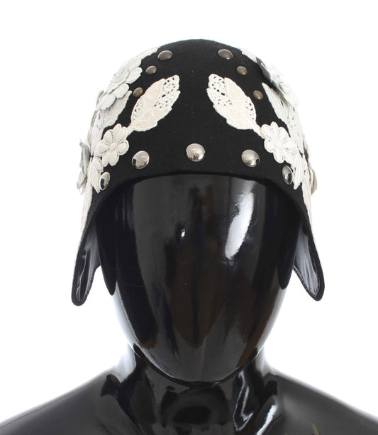 Schwarze Wollmütze mit weißem Blumenmuster und Blattgold