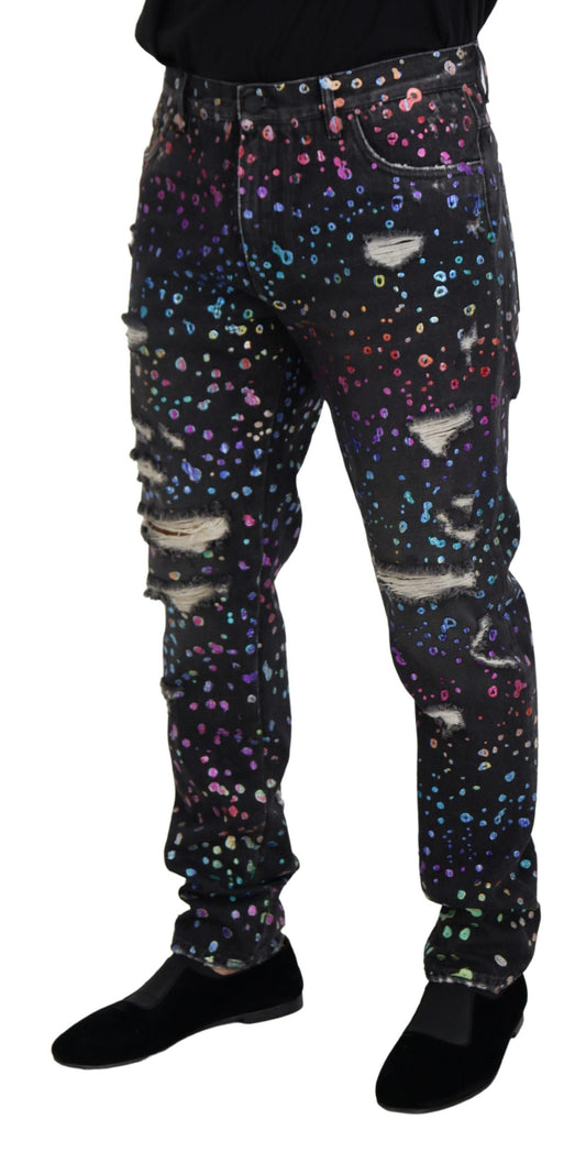 Schwarze zerfetzte Jeans mit mehrfarbigem Print