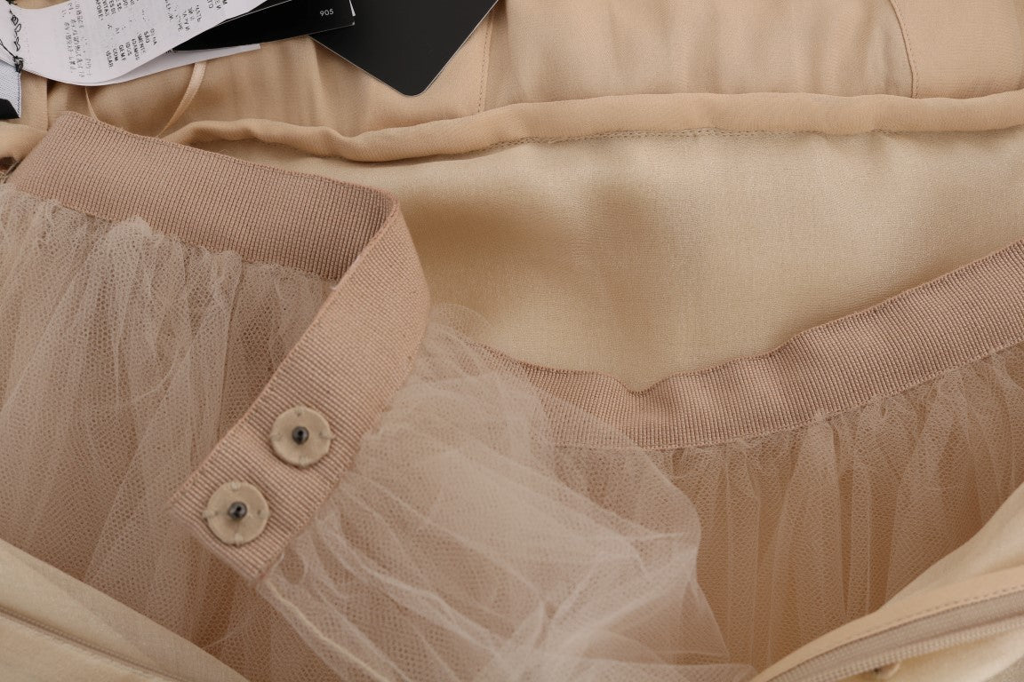 Goldfarbenes Seidenkleid mit Kristallverzierung