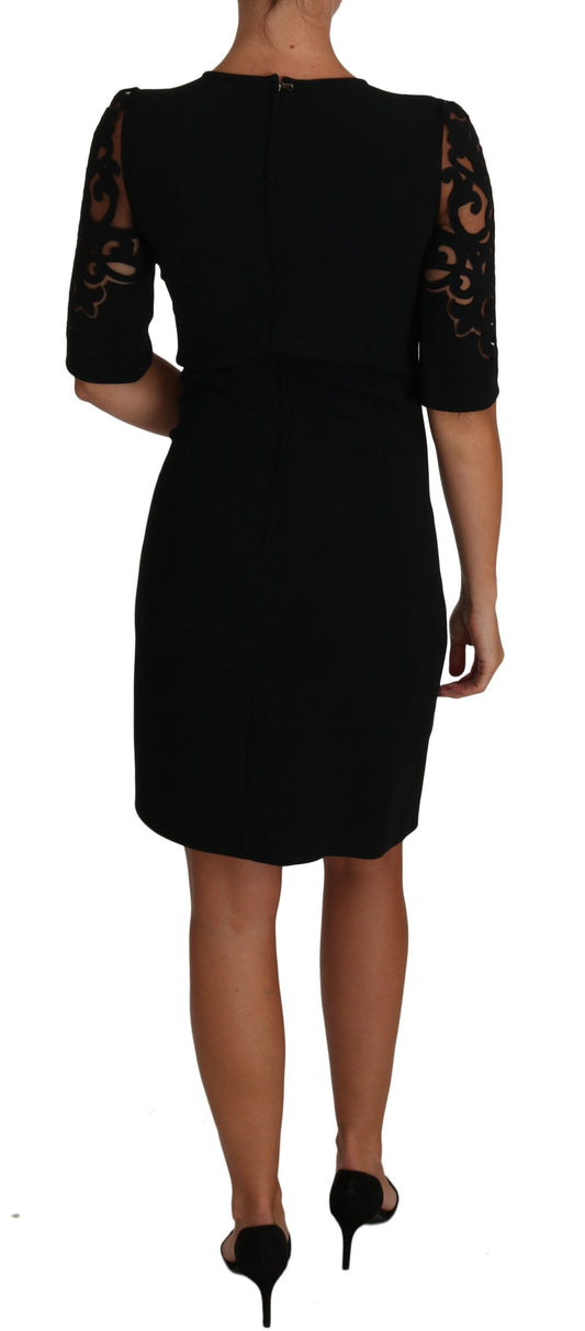 Schwarzes Cocktailkleid mit Blumen- und Cut-out-Muster